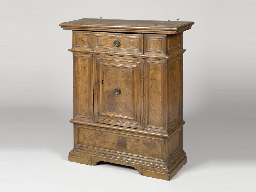 Wooden cabinet with a drawer and door
